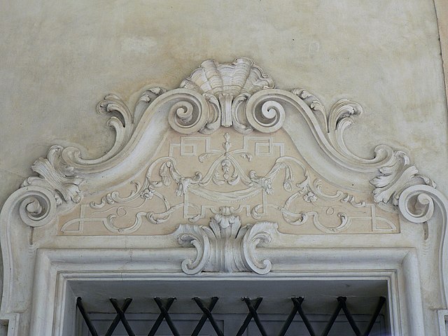 a decorative doorway with bars