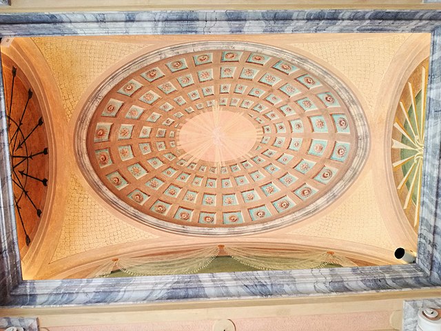 a ceiling with a painted ceiling